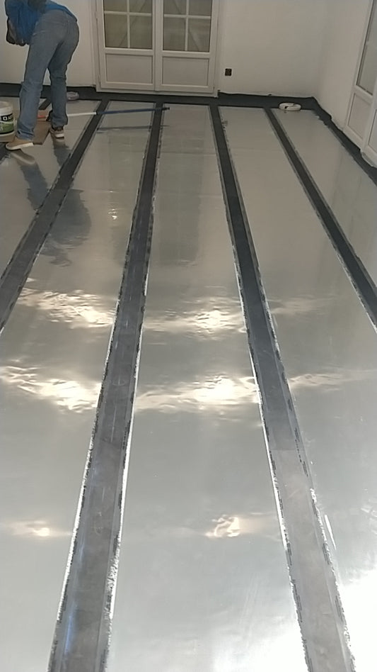 Membrane carbone 100cm de large et 80W/m2 installation au sol sous revêtements flottants. (Copie)